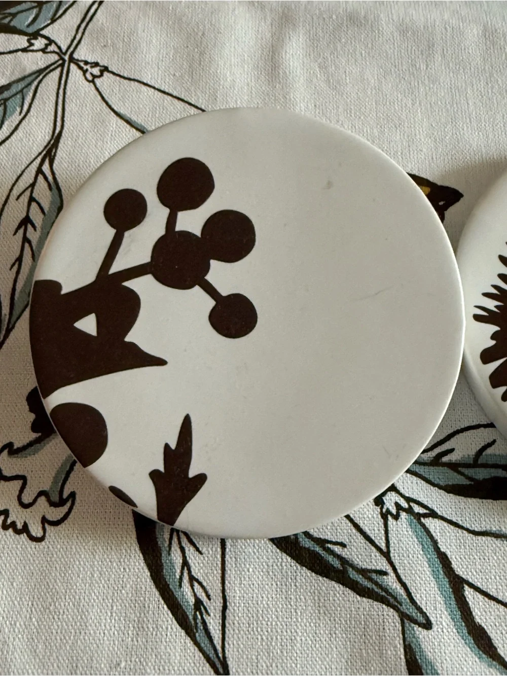 West End Round Botanical Wall Coasters White w/ Dark Brown Silhouettes -set of 5